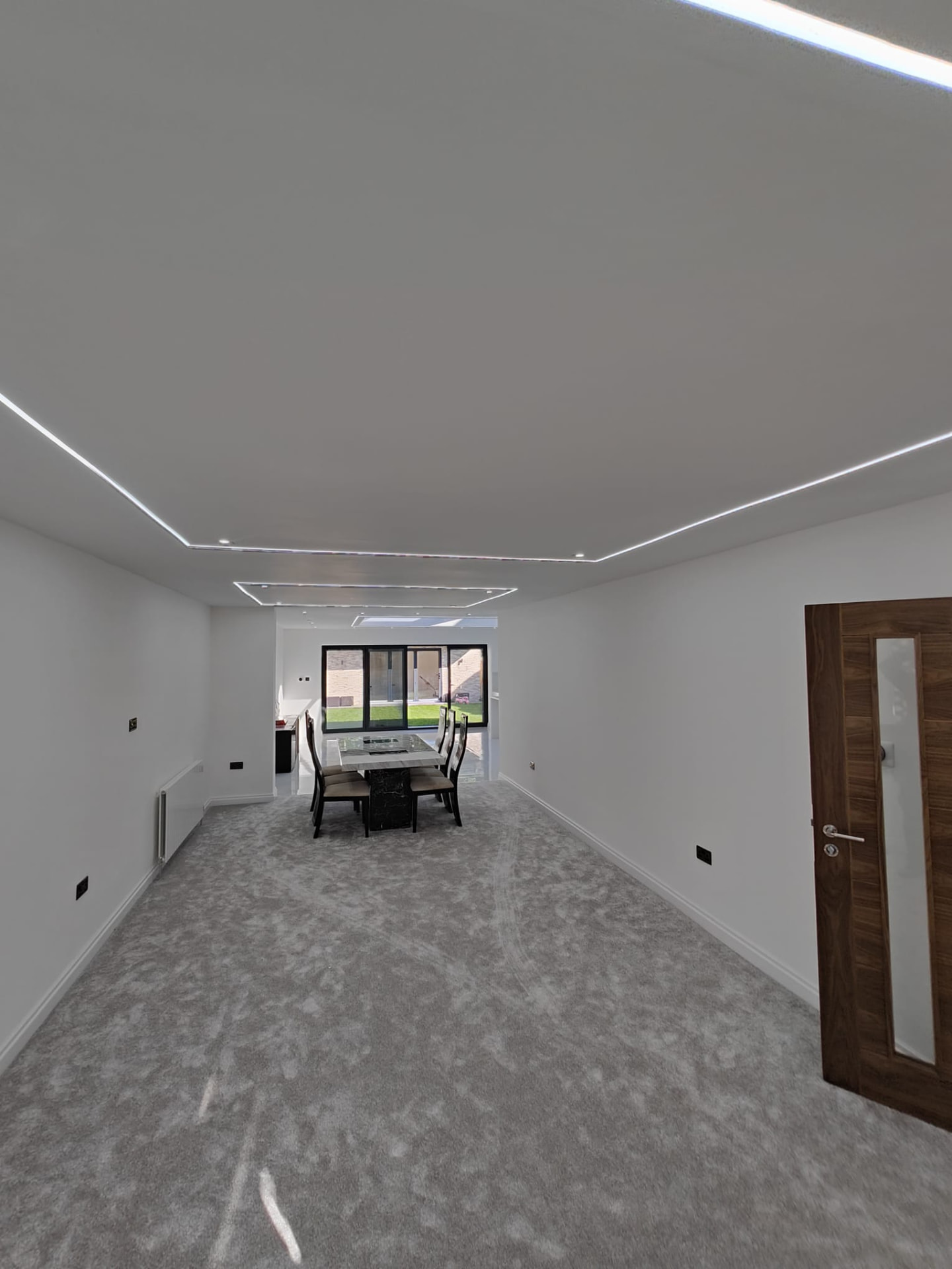 Finished dining room with recessed LED plastered ceiling, Leeds plastering