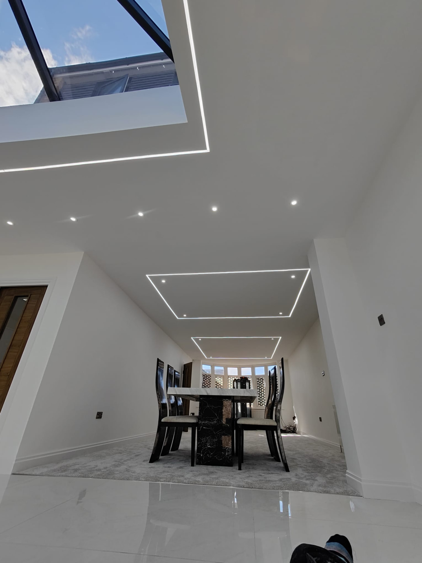 Elegant dining room with square recessed LED ceiling and premium plaster finish, Leeds